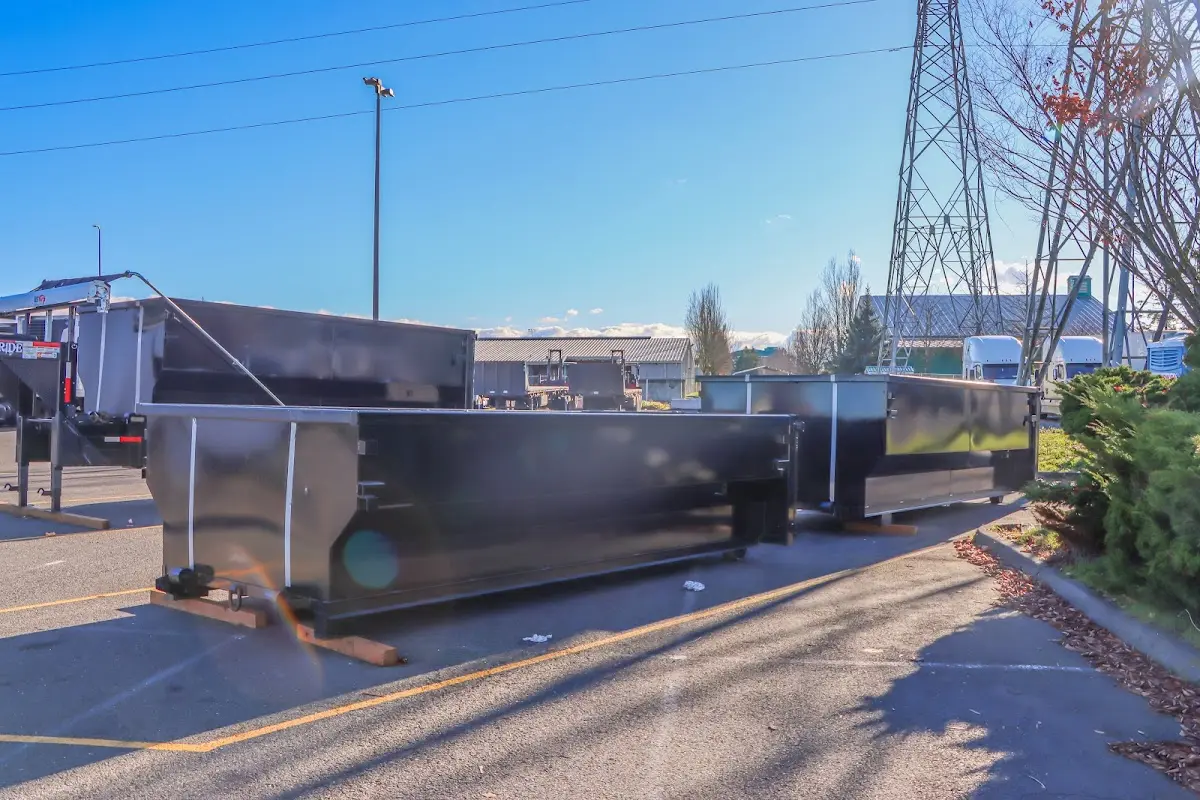 Roll-off dumpster ready for waste disposal at job site for 2 Yard Dumpster Rental in Yarmouth